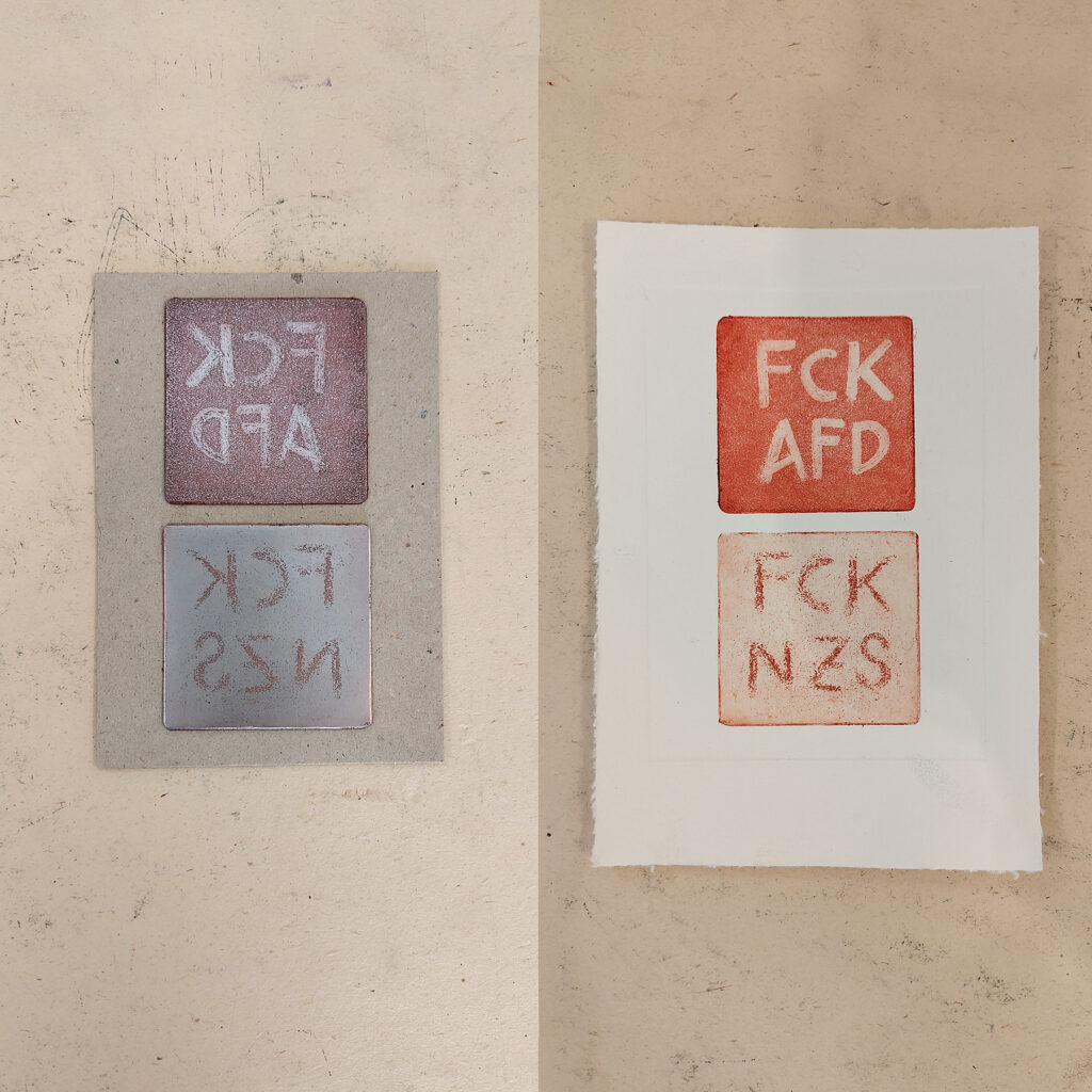 Two zinc plates on which "FCK A*D &amp; FCK NZS" are applied using the blasting technique. Next to it is a finished print of the plates in red.